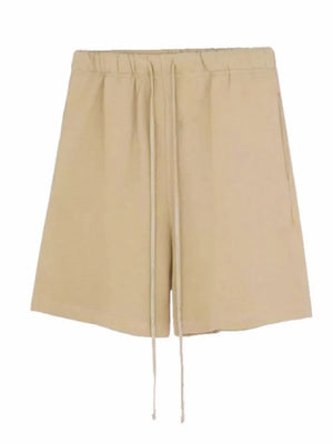 Men's beige jogger shorts with drawstring waist and pockets.