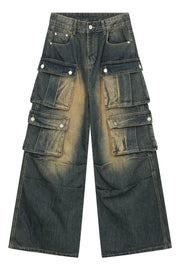 Distressed medium wash denim cargo pants with multiple button-flap pockets and a wide leg.