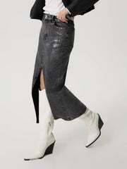 Black distressed denim maxi skirt with high slit and buttoned waist.