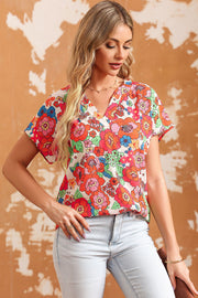 Multicolor floral print V-neck cap sleeve blouse with a casual fit.