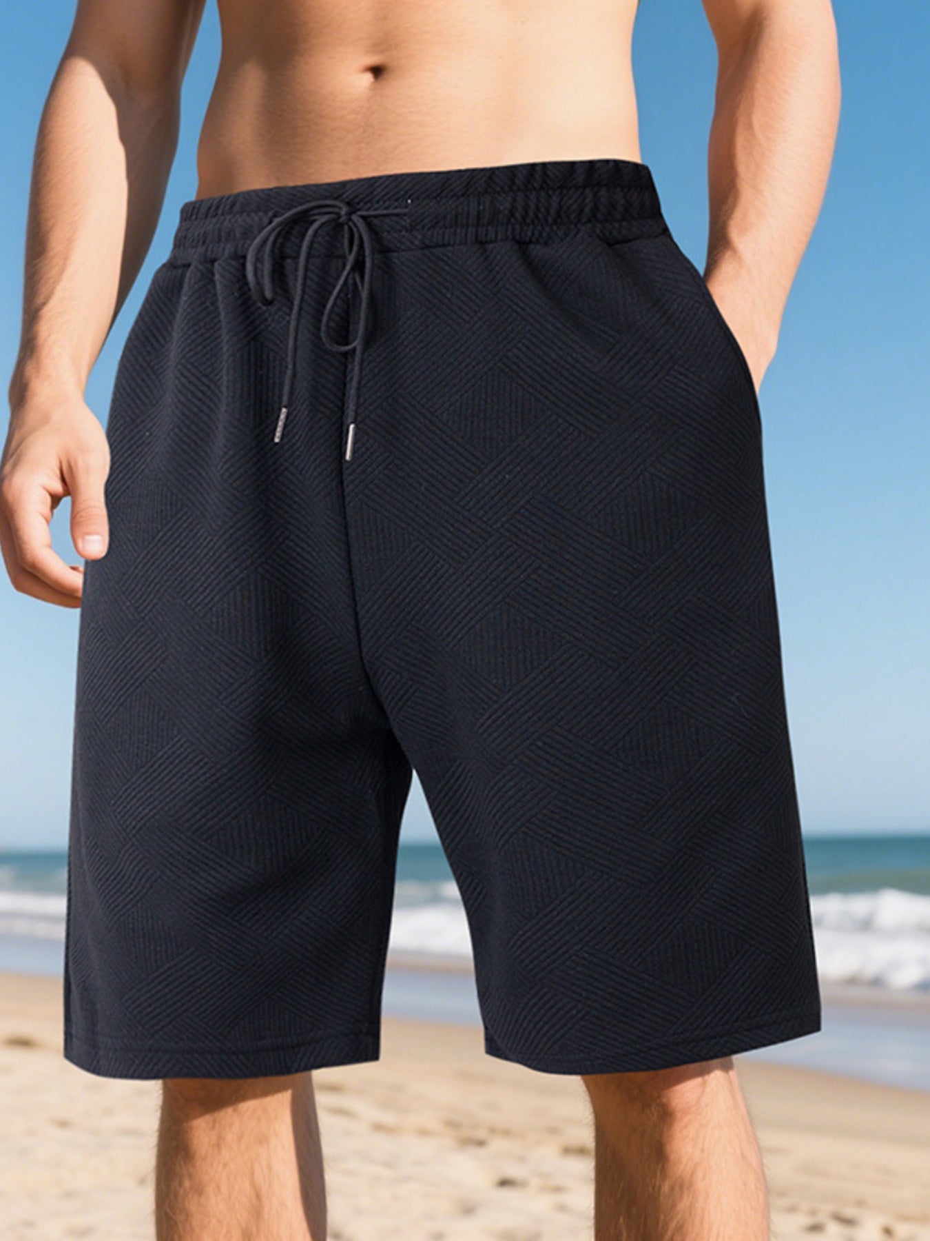 Navy blue chino shorts with geometric pattern and drawstring waist, relaxed fit.