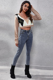 Argyle collar crop knit sweater in taupe with V-neck and long sleeves.