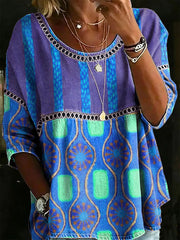 Bohemian maternity t-shirt with blue and purple stripes and floral pattern.