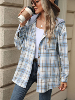 Light blue plaid shacket with contrast grey hood and white drawstrings, button front, and chest pocket.