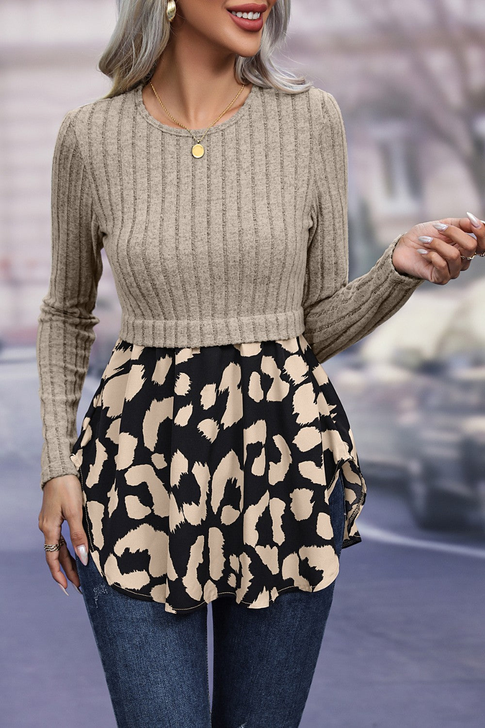 Beige ribbed knit peplum blouse with leopard print hem and long sleeves