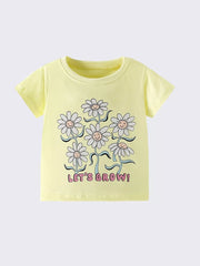 Yellow cotton t-shirt with cheerful daisy graphic and text LET'S GROW!