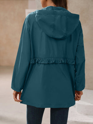 Teal hooded windbreaker jacket with ruffled waistline detail