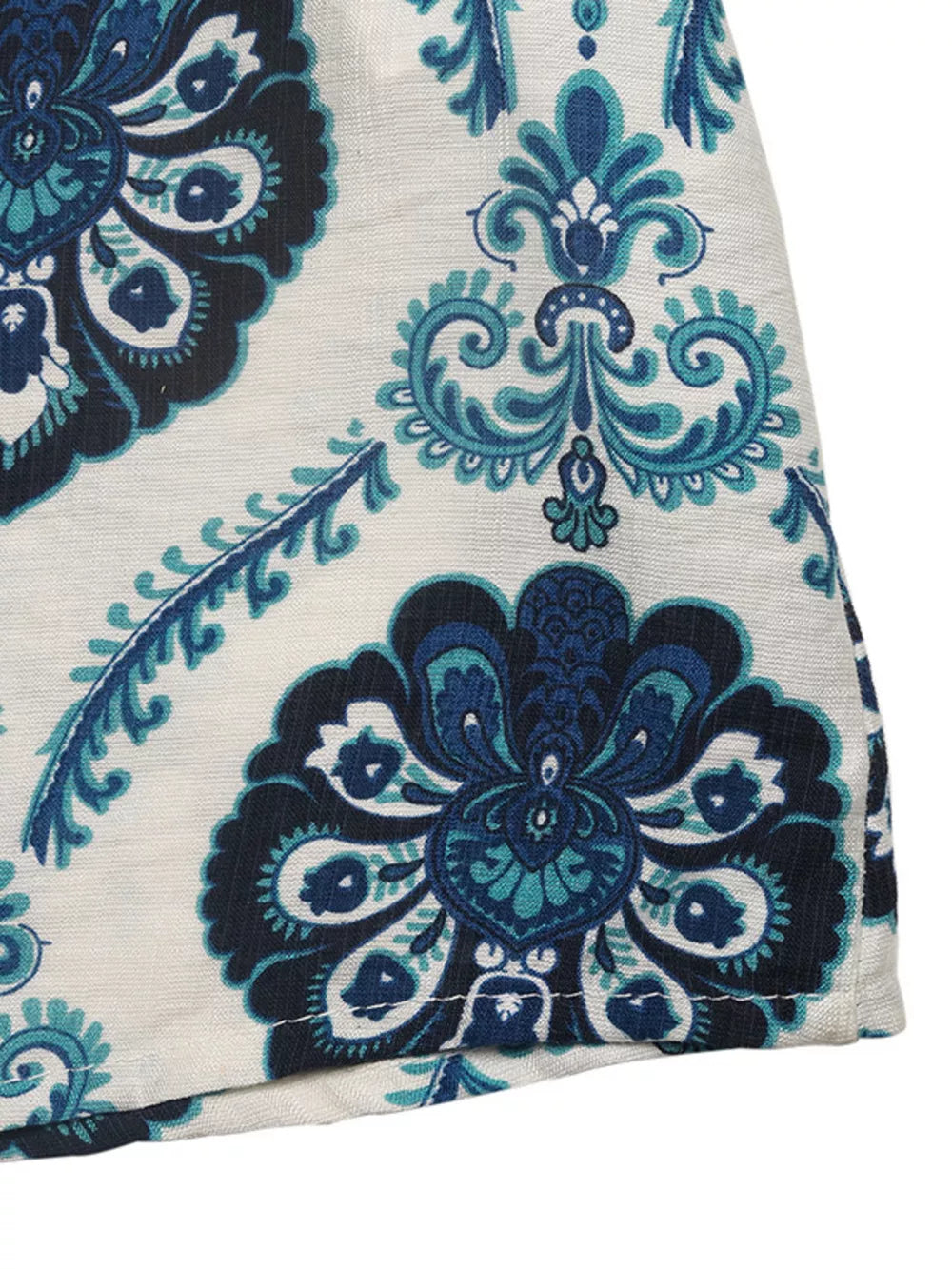 Maxi dress with blue paisley print and decorative buttons detail