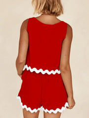 Scalloped edge tank and short co-ord set in scarlet red with white trim.