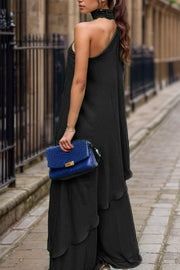 Black asymmetric drape wide-leg choker set with tiered skirt detail.