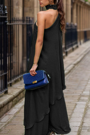 Black asymmetric drape wide-leg choker set with tiered skirt detail.