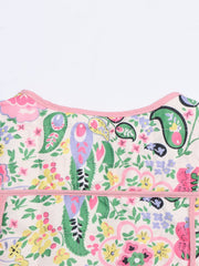 Paisley quilted jacket with pink trim and a colorful floral print.