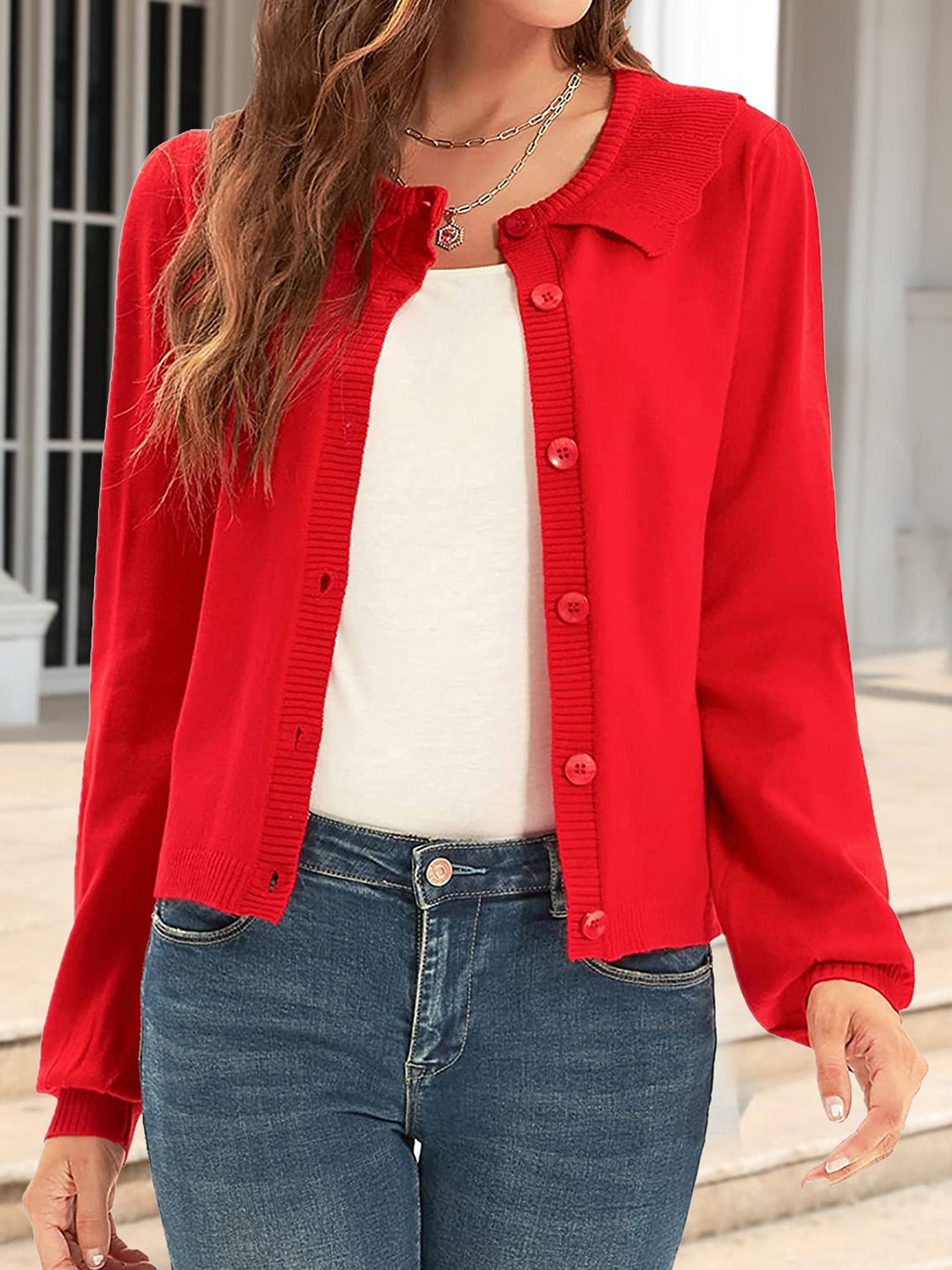Red knit cardigan with scalloped collar and button front