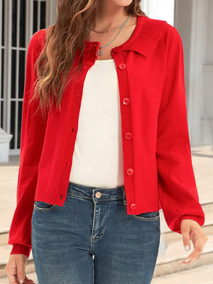 Red knit cardigan with scalloped collar and button front