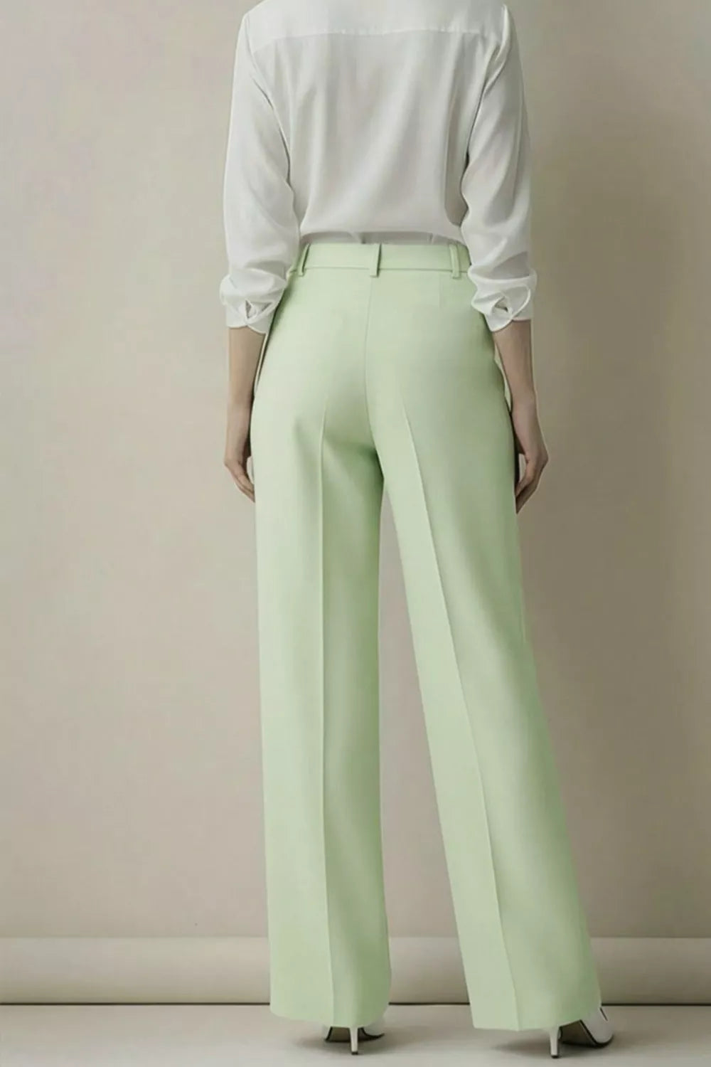Chic high-waisted wide-leg trousers in gum leaf green with a relaxed fit.