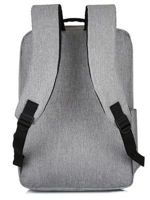 Light gray textured canvas school backpack with black adjustable straps and top handle.