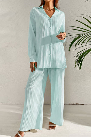 Pastel blue pleated co-ord set with button-down shirt and wide leg trousers