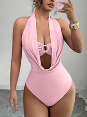 Pink halter neck cutout ruched bodysuit with a draped neckline and ring detail.