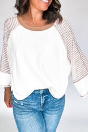 Textured raglan sleeve tee in white with patterned sleeves and tan neckline.