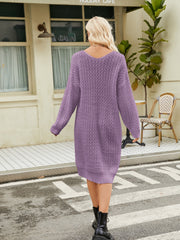 Lavender textured knit V-neck midi dress with long sleeves and a casual fit.