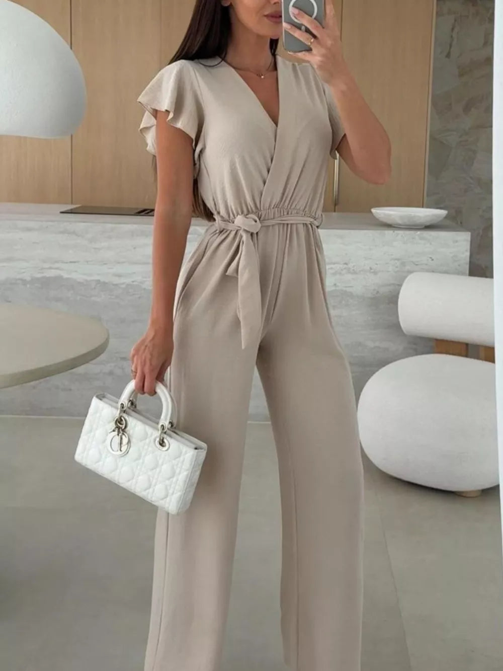 Surplice Ruffle Sleeve Wide Leg Jumpsuit in Black, back view