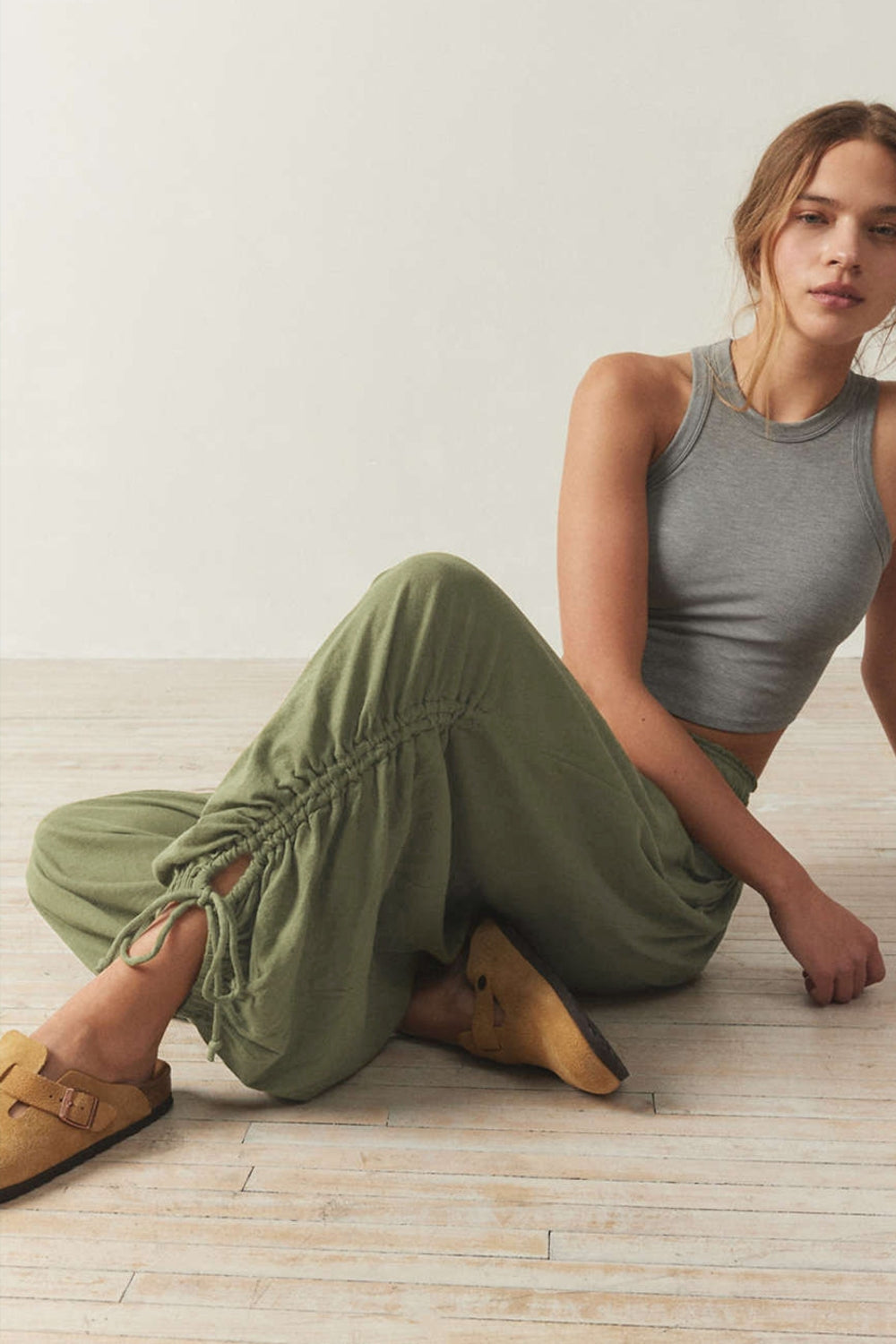 Gathered ankle-tie balloon trousers in Matcha Green with a relaxed fit.