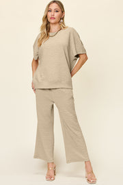 Khaki textured cocoon top and wide leg pants set with short sleeves and crew neck.