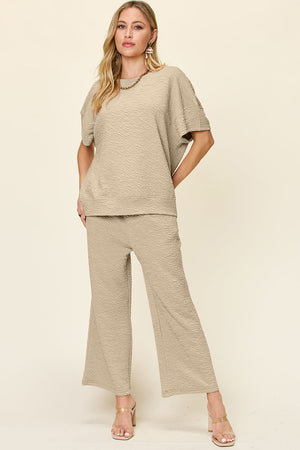 Khaki textured cocoon top and wide leg pants set with short sleeves and crew neck.