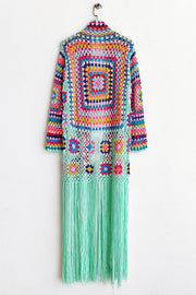 Granny square crochet duster with fringe in multicolor and mint green, open front, long sleeves, boho style.