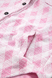 Pink diamond weave shacket with button details and textured fabric.
