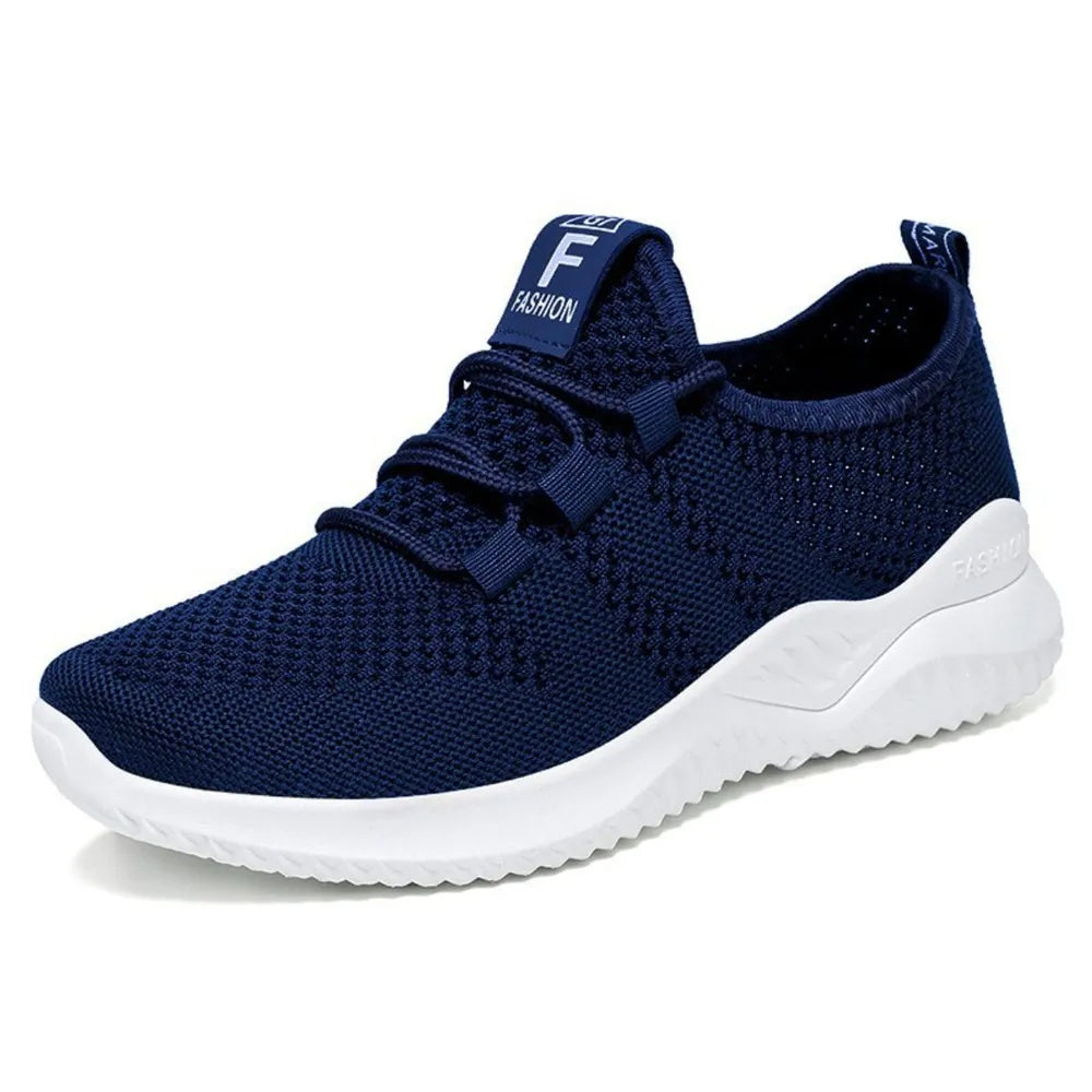 Navy breathable knit runner sneaker with white sole and logo detail on tongue.