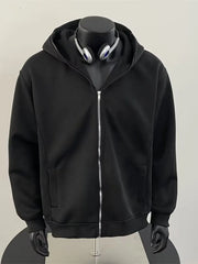 Black zip-up hoodie for men with a comfortable fit and cotton blend material.