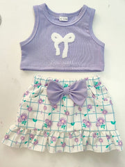 Lavender ribbed tank top with white bowknot and floral print skirt with purple bowknot