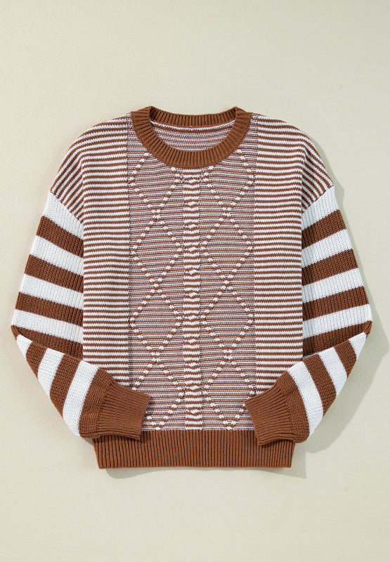 Brown and white geometric stripe knit sweater with a crew neck.