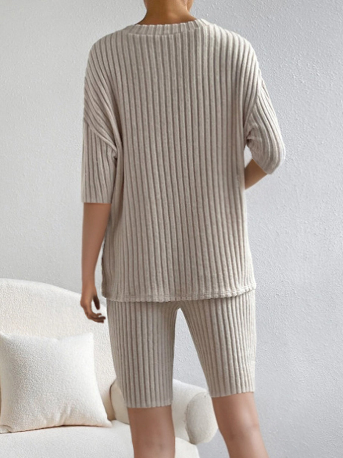 Ribbed knit loungewear set in mocha with a V-neck top and bike shorts.