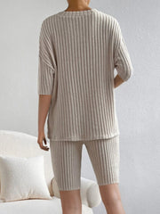 Ribbed knit loungewear set in mocha with a V-neck top and bike shorts.