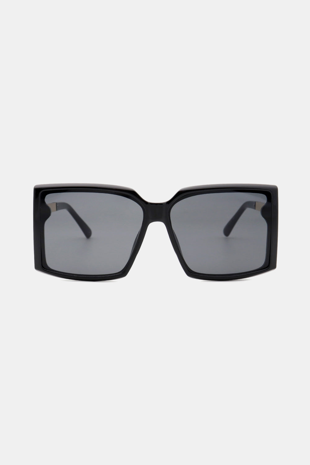 Black geometric sunglasses with gradient grey lenses and bold square frames.