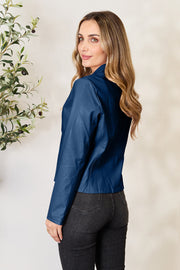 Biker-inspired faux leather jacket in French Blue with a stand-up collar and long sleeves.