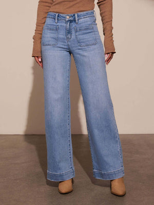 Sailor-inspired wide leg jeans in light wash denim with utility pockets.