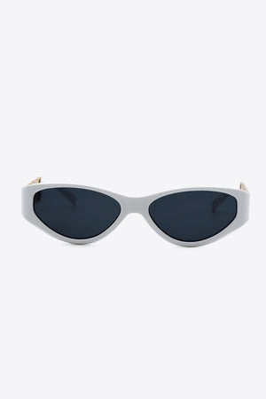 White frame cat-eye sunglasses with dark lenses and chain detail on temples.