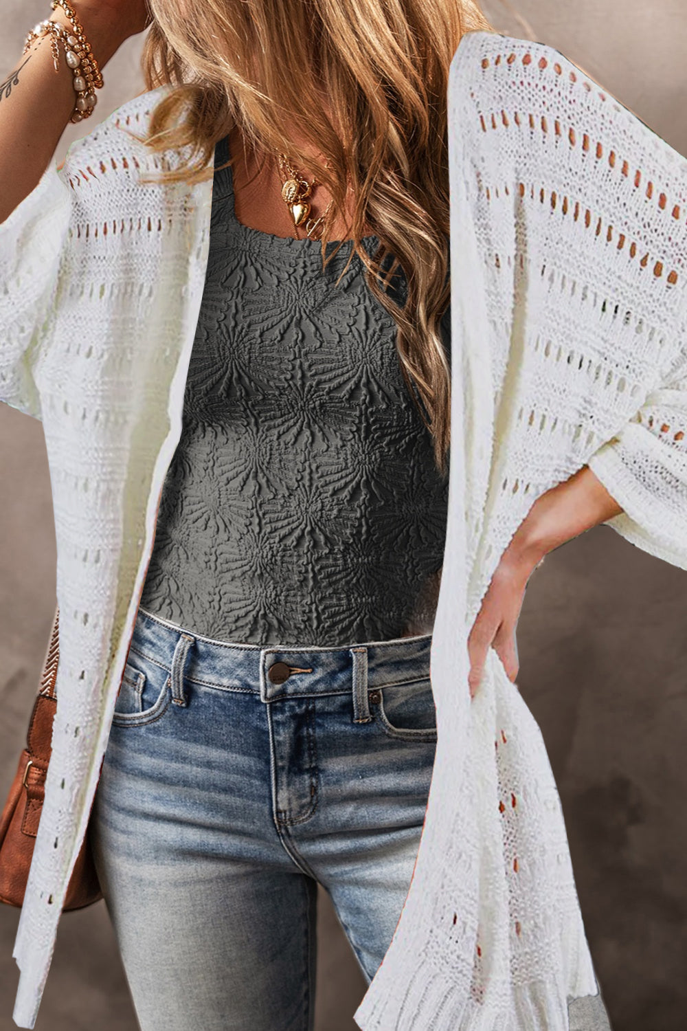 White open-knit dolman sleeve cardigan with a breathable acrylic weave.