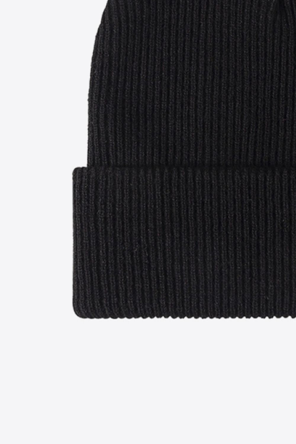 Black ribbed knit beanie with a cuffed hem