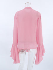Pink ruffled flounce sleeve blouse with buttoned front and airy fabric.