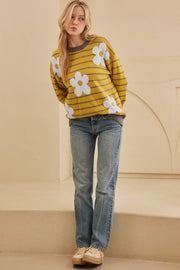 Yellow striped intarsia knit sweater with white daisies and grey trim.