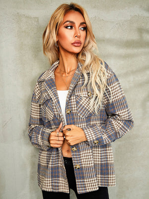 Collared plaid jacket with button front and chest pockets.