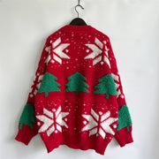 Red acrylic knit sweater with festive Christmas tree and snowflake appliqué details.