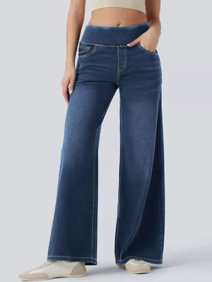 Maternity wide-leg jeans in dark blue denim with a comfortable elastic waistband and contrast stitching.