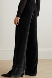 Black velvet palazzo trousers with high waist and wide leg