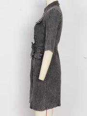 Grey denim shirt dress with zipper front, belt, and pockets.