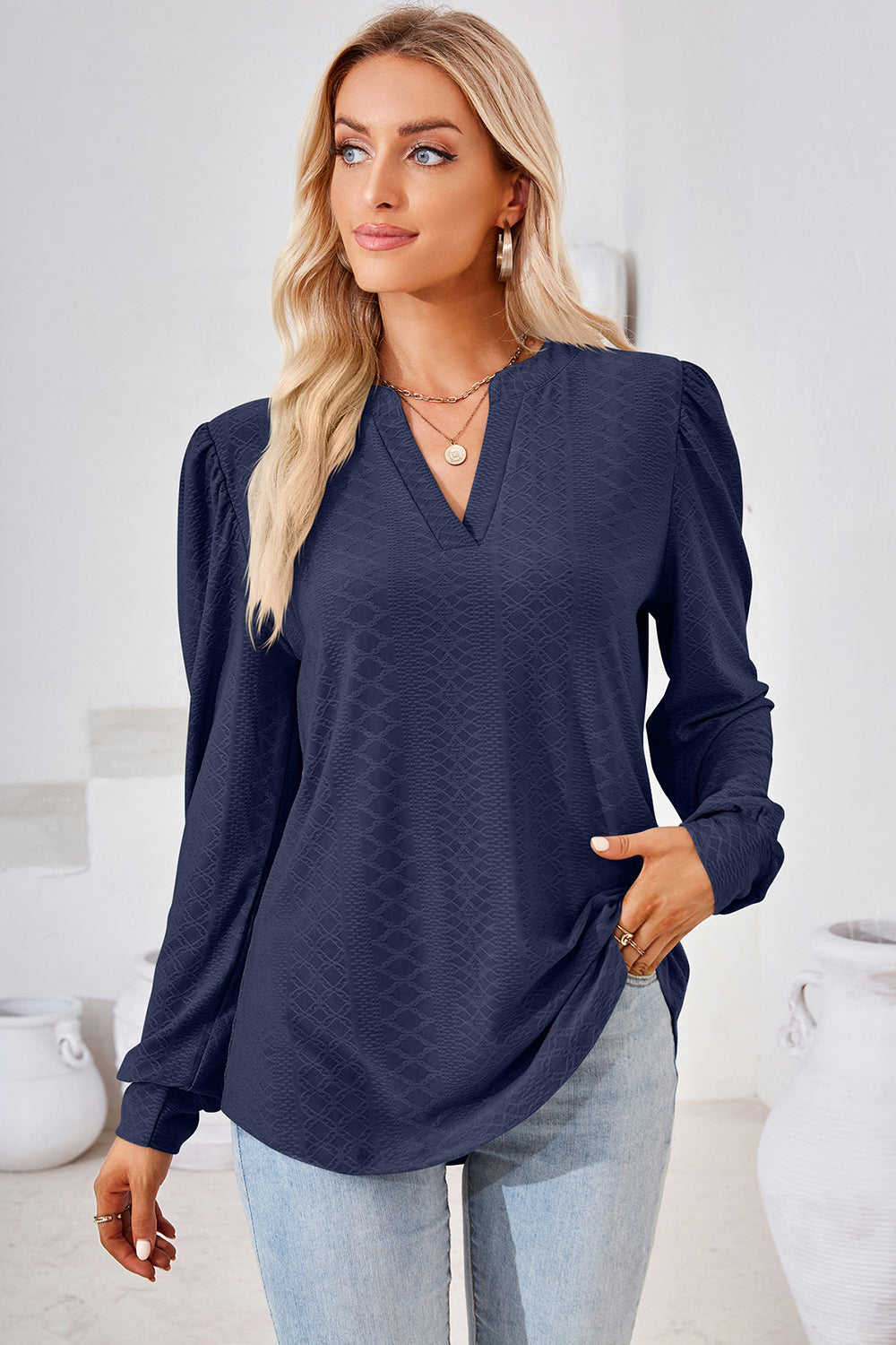 Dark Blue textured henley blouse with puff sleeves and V-neck